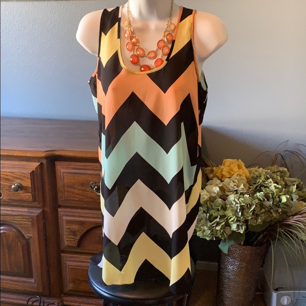 Sheer sleeveless tunic